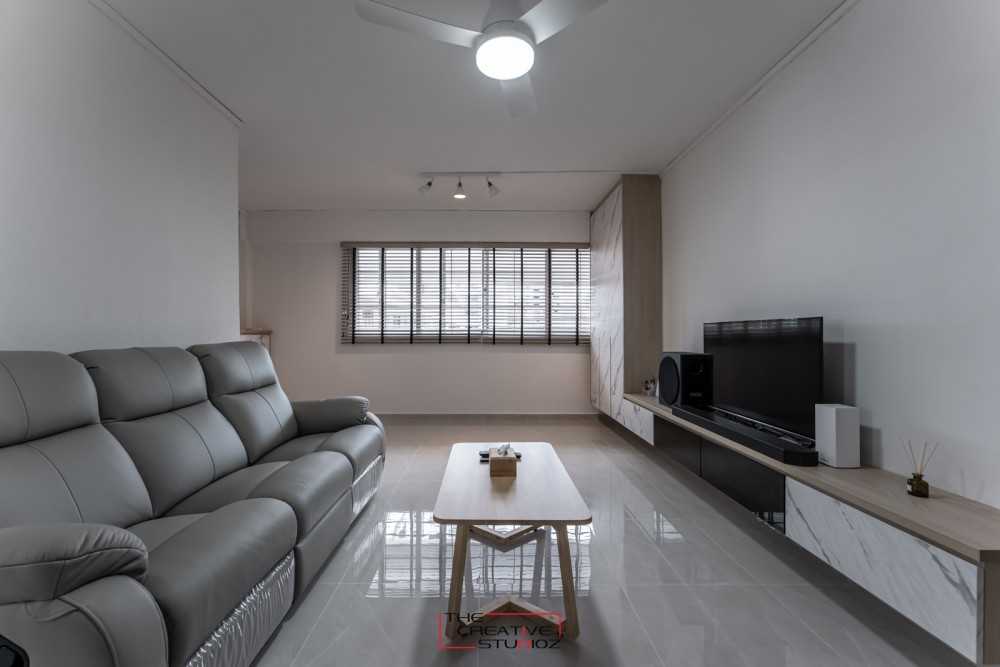 Scandinavian Living Room with Homogeneous Tiles and TV Console