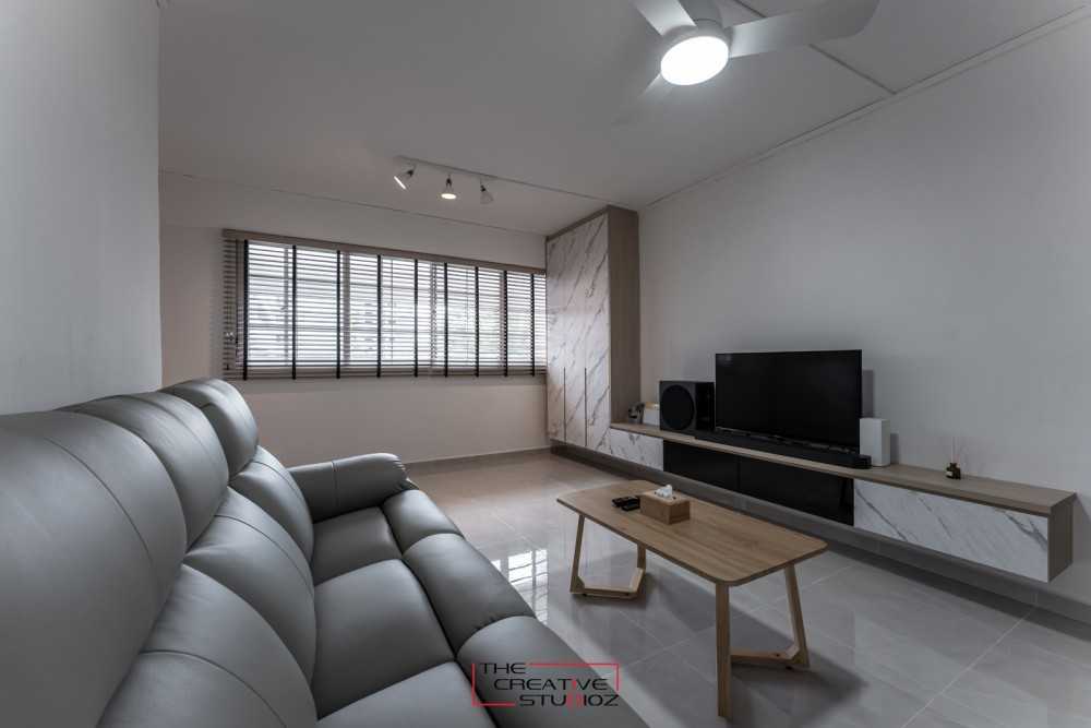 Scandinavian Living Room with Homogeneous Tiles and TV Console