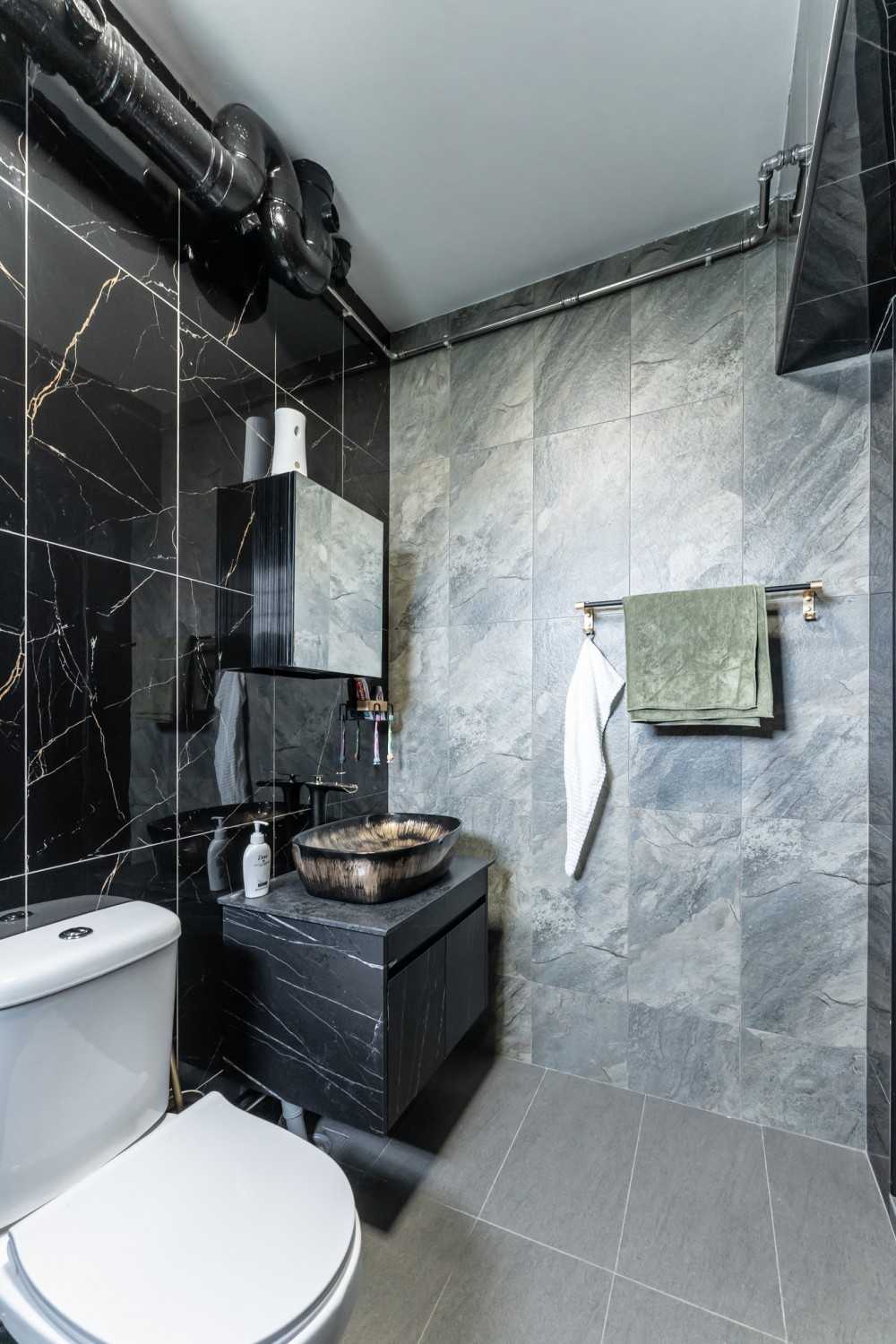 Modern Bathroom with Homogeneous Tiles and Rainshower