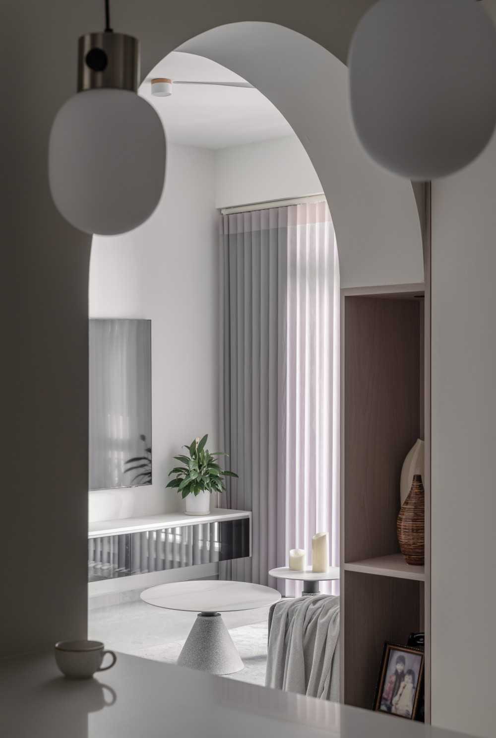 Scandinavian Living Room with Drop Light and Open Storage