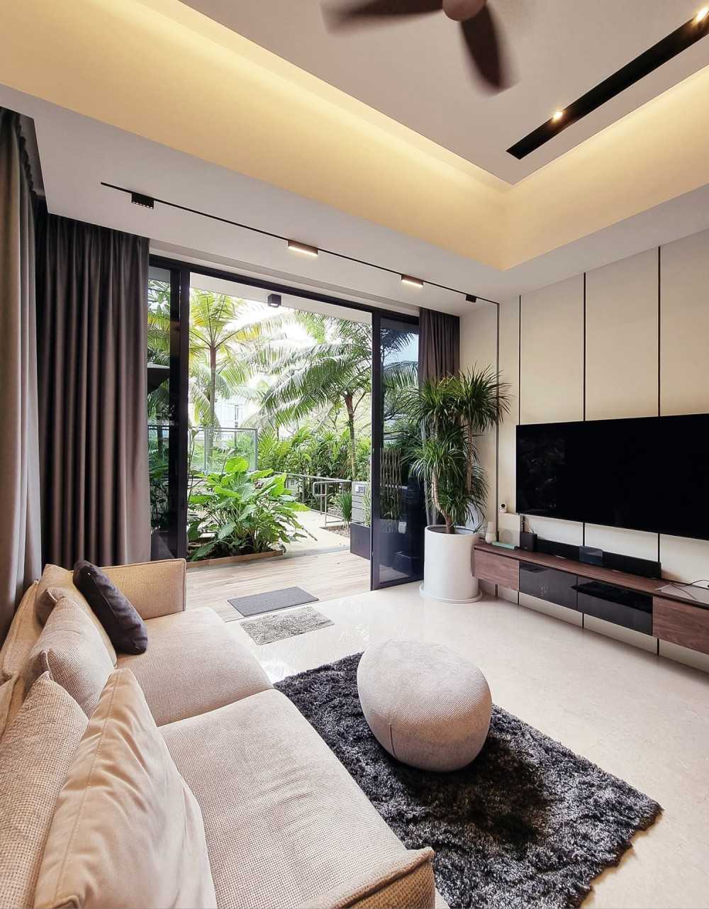 Modern Living Room with TV Console and Glass Door