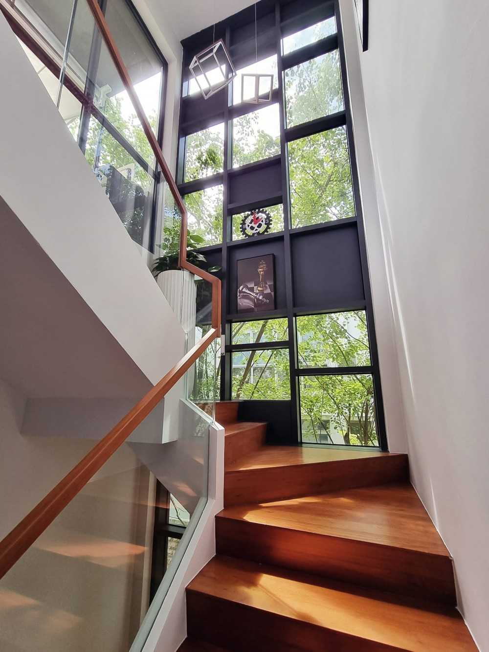 Modern Living Room with Window Grille and Paintings