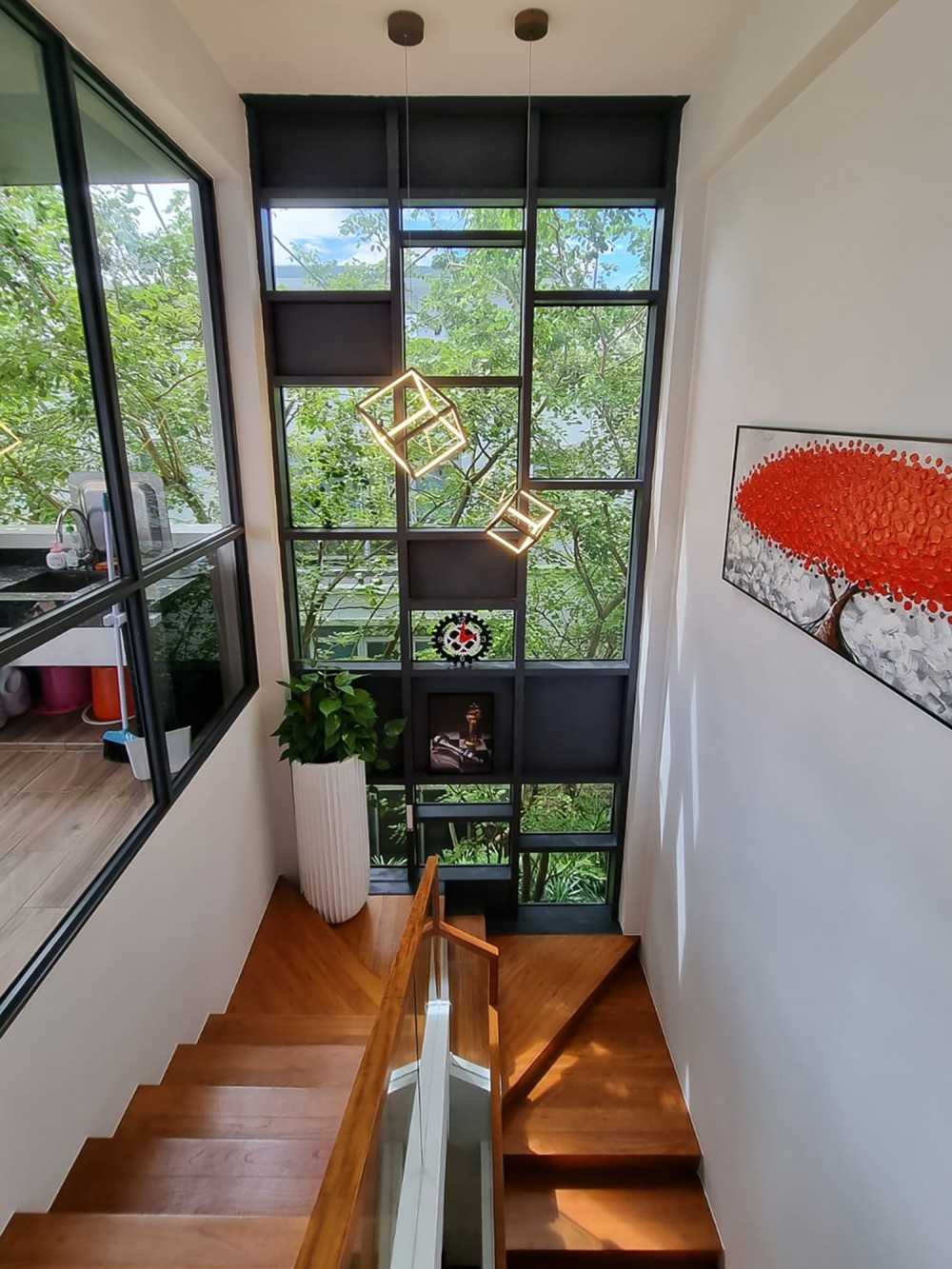 Modern Living Room with Window Grille and Paintings