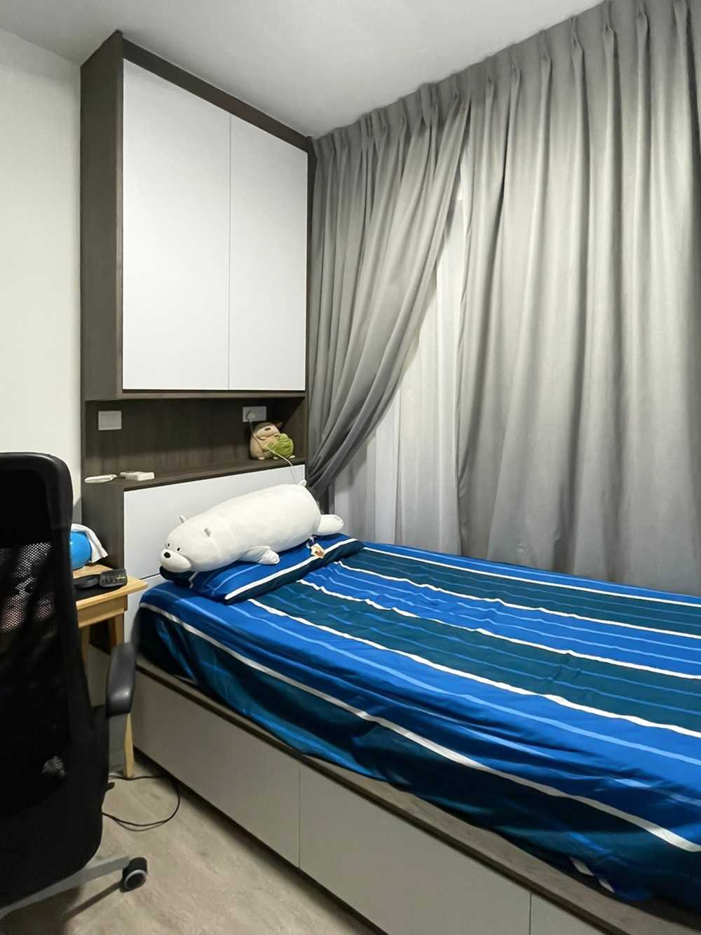 Scandinavian Bedroom with Built-in Bed and Paintings