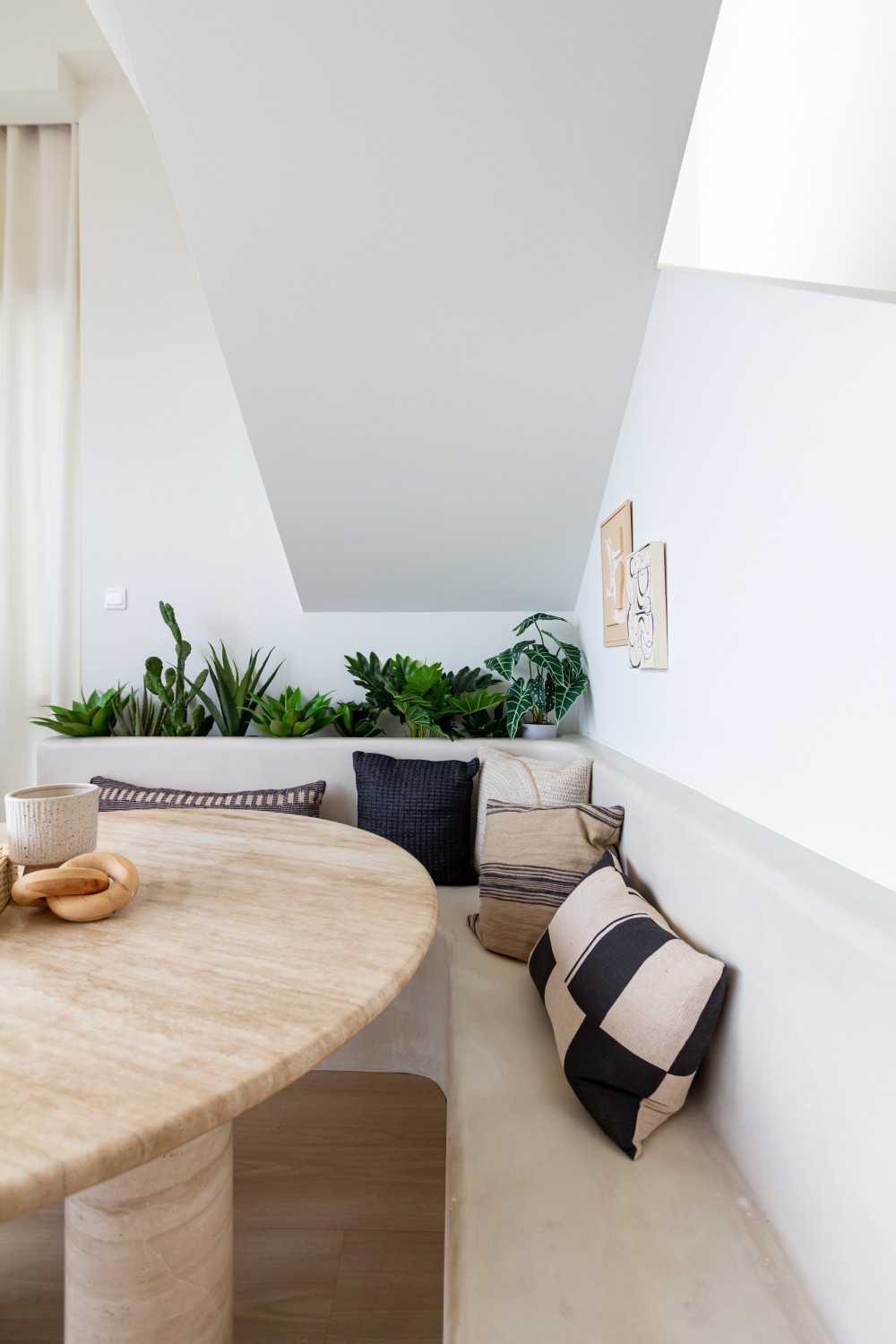 Minimalist Dining Room with Dining Table and Houseplants