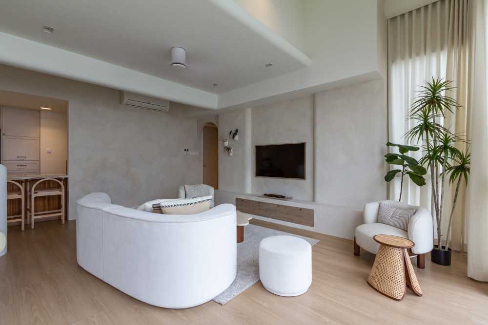 Minimalist Living Room with TV Console and Houseplants
