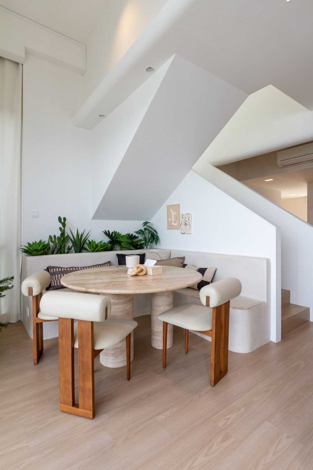 Minimalist Dining Room with Dining Table and Houseplants