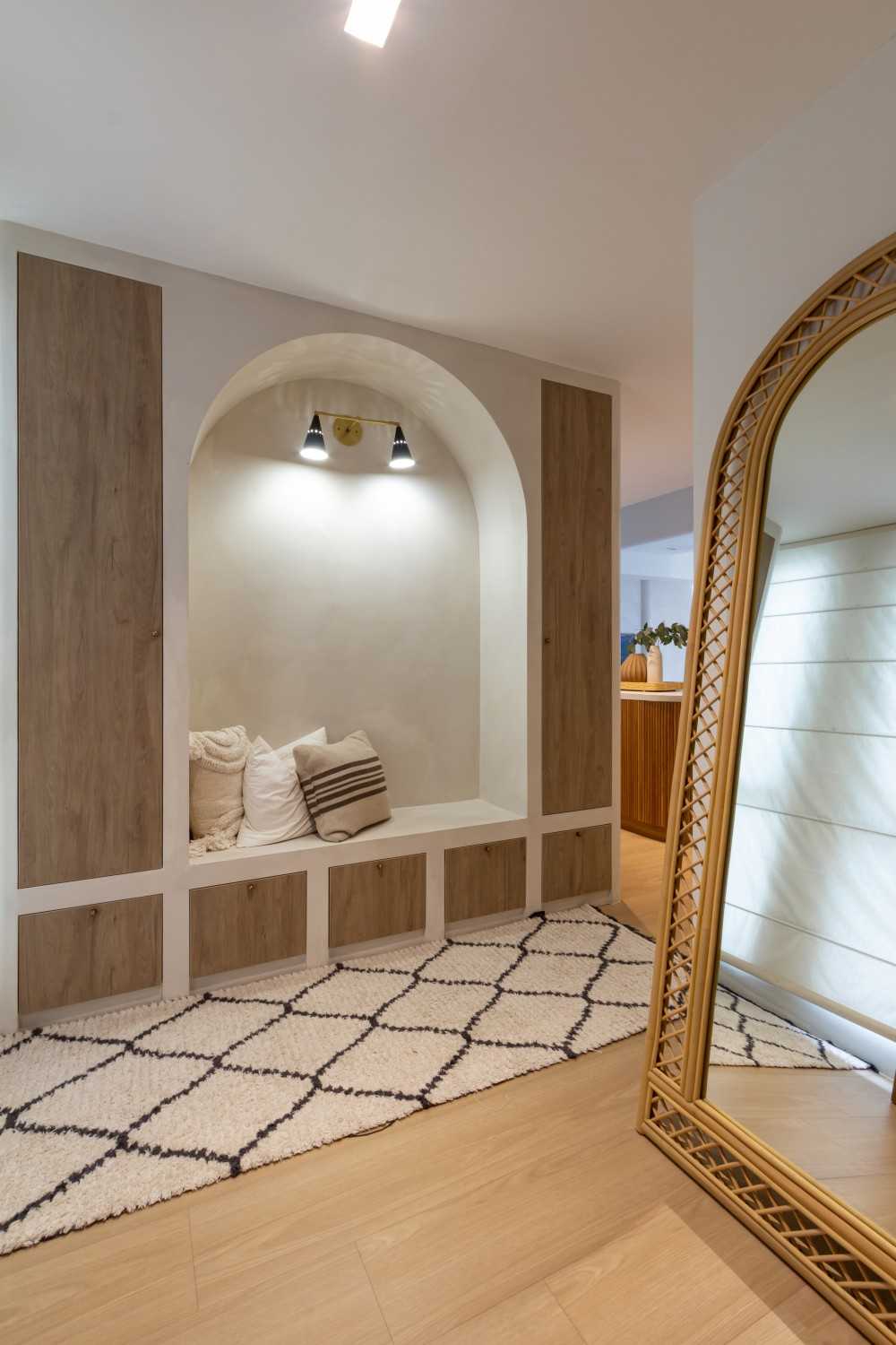 Minimalist Entryway with Mirror and Small Storage