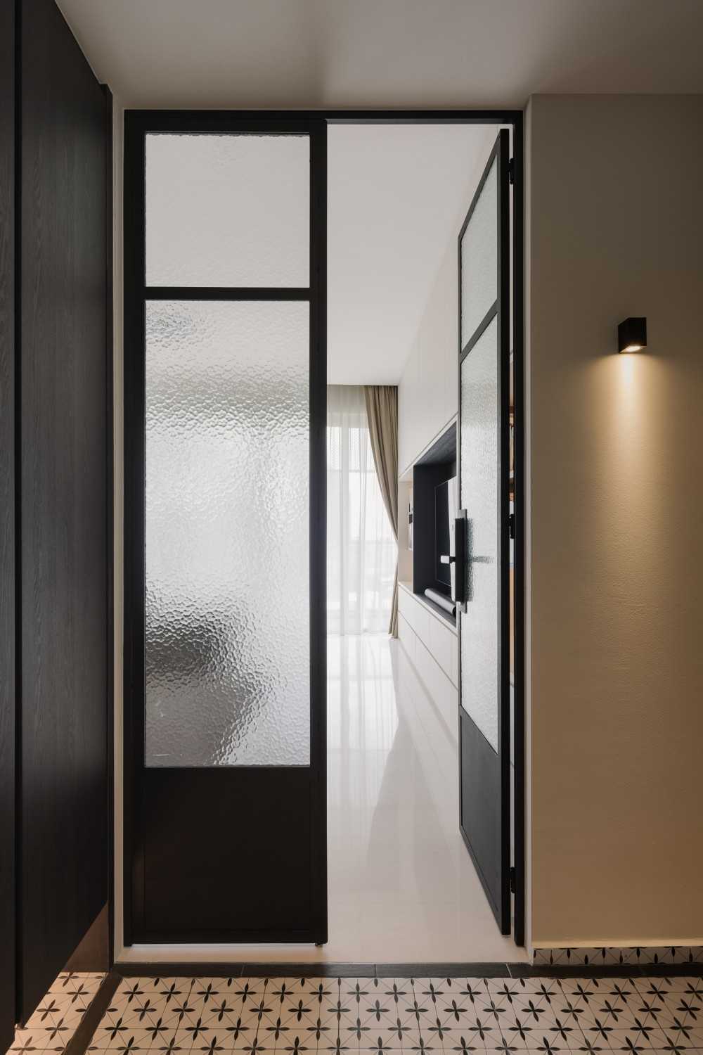 Contemporary Entryway with Glass Door and Shoe Cabinets