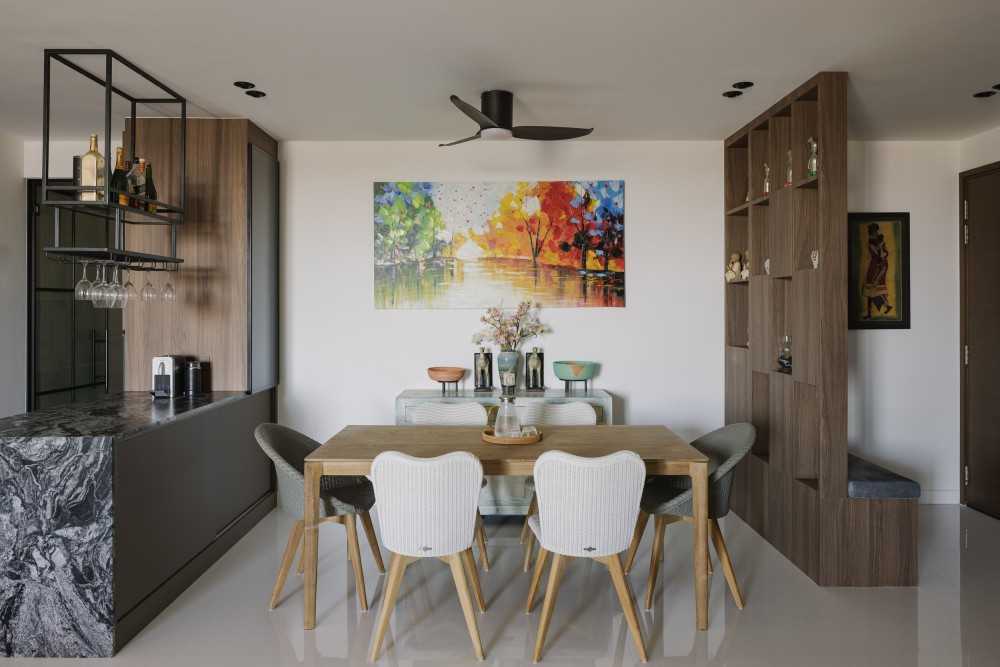 Modern Dining Room with Artwork and Bar Counter