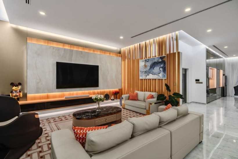 Modern Living Room with Cove Lighting and Carpet