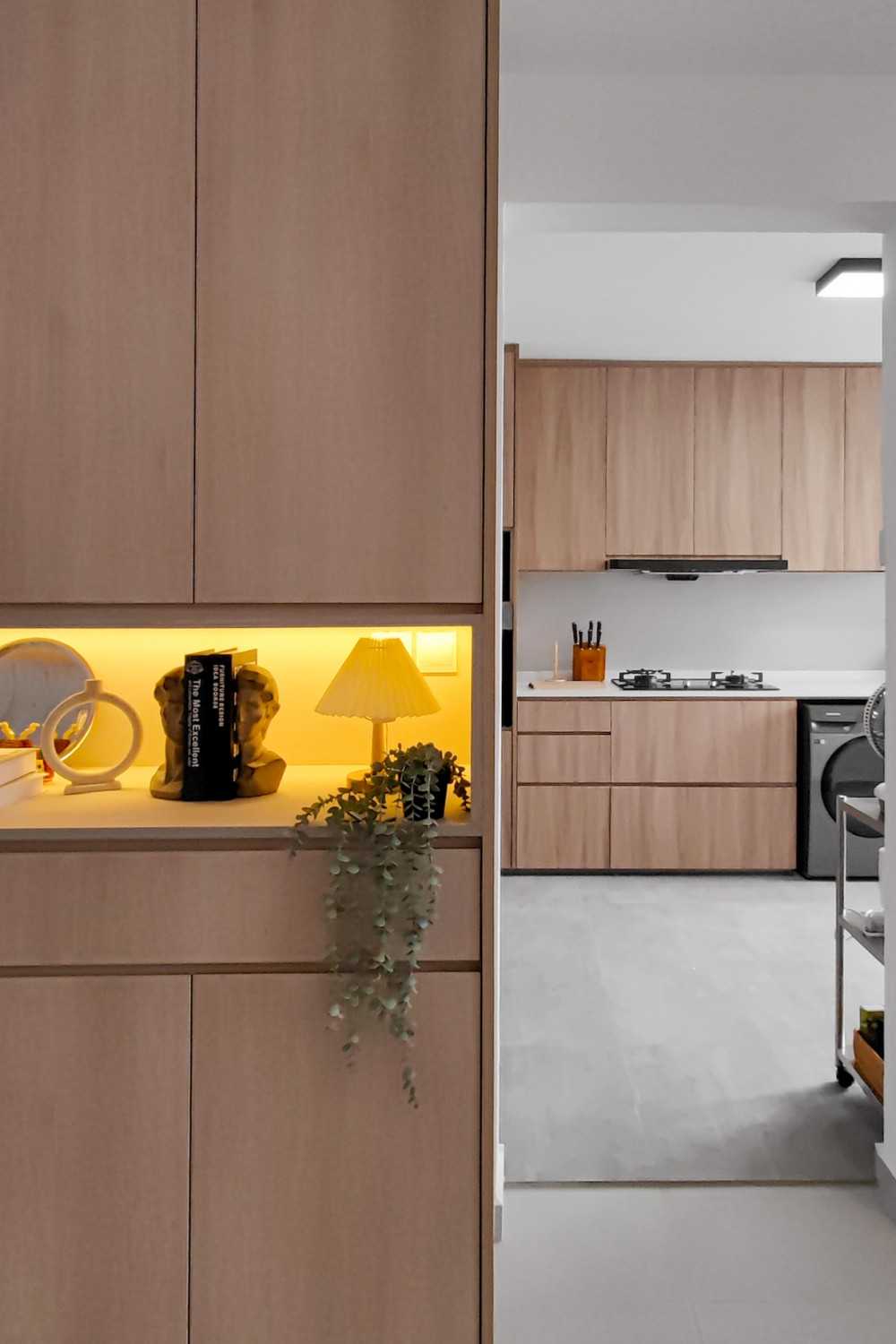 Minimalist Hallway with Bookshelf and Washing Machine