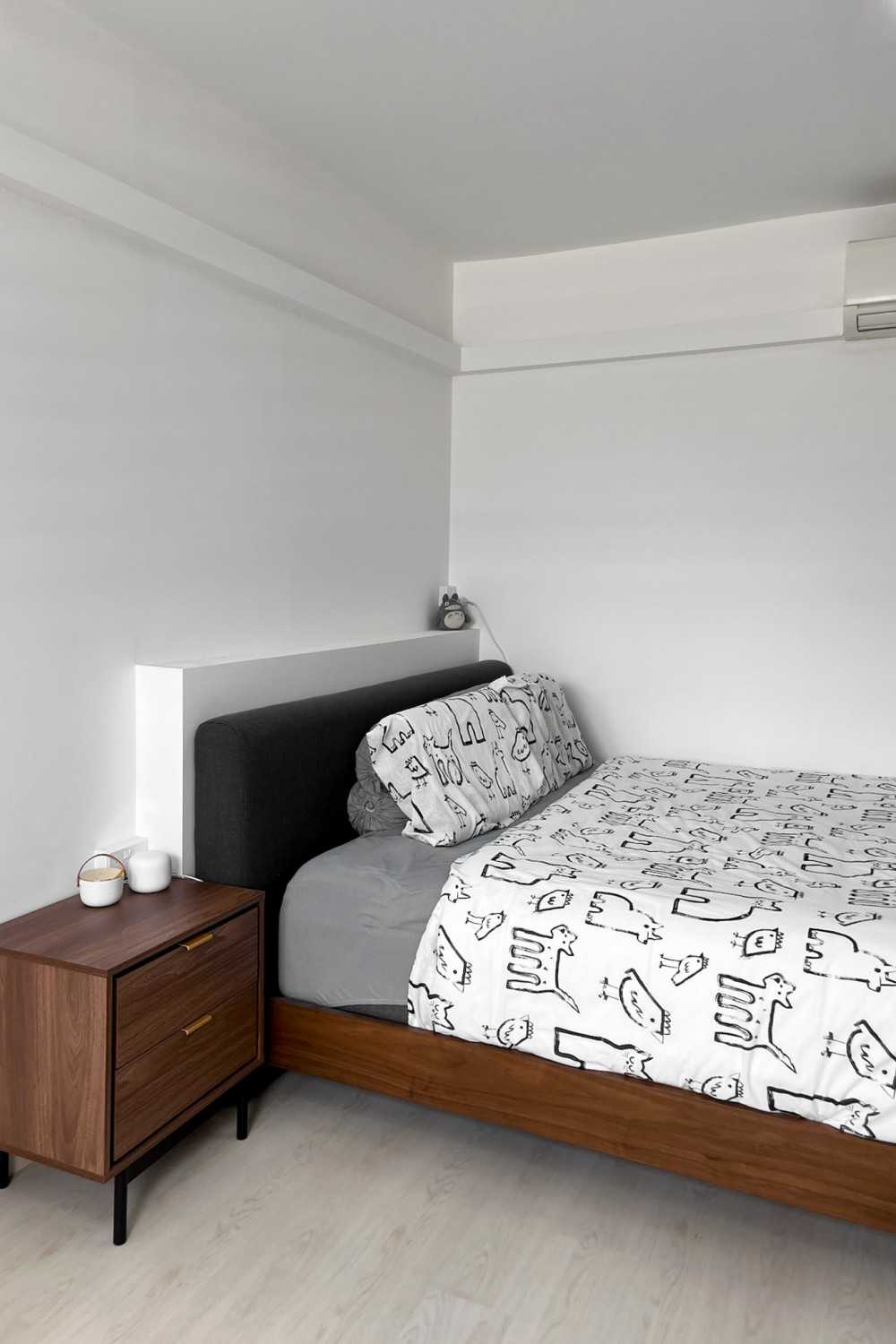 Minimalist Bedroom with Bedside Table and Small Storage