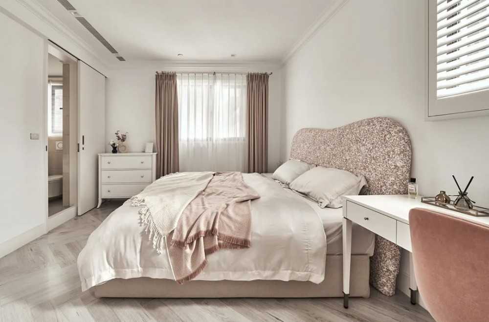 Contemporary Bedroom with Herringbone Tiling and Bedside Table