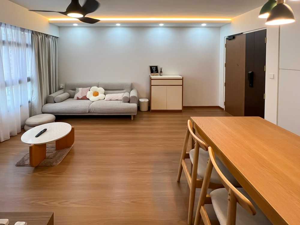 Scandinavian Living Room with Sofa and Paintings