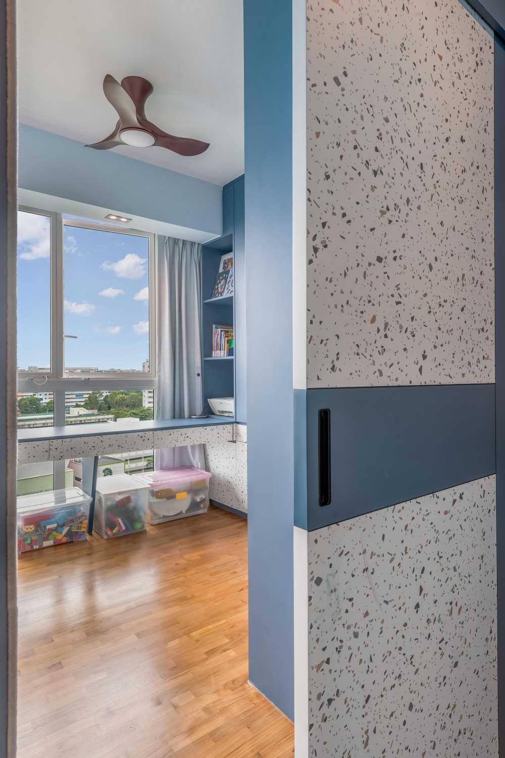 Contemporary Kids Room with Bookshelf and Toys
