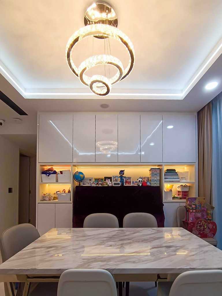 Modern Dining Room with Sideboard and Paintings