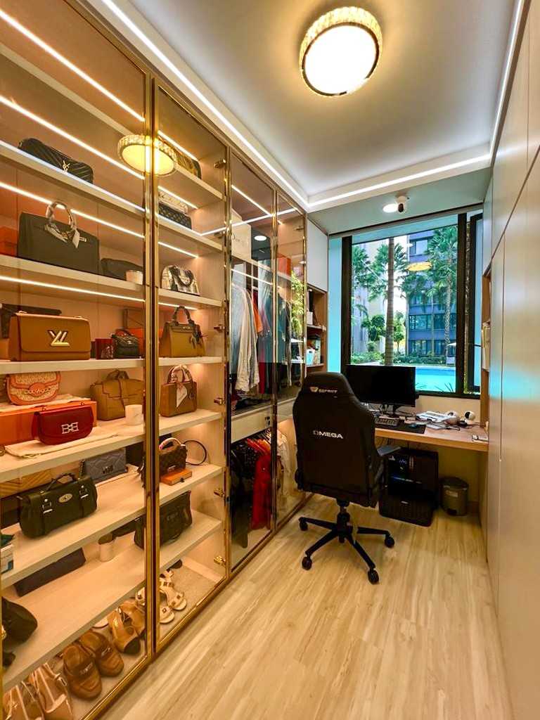 Modern Study with Paintings and Storage Cabinets