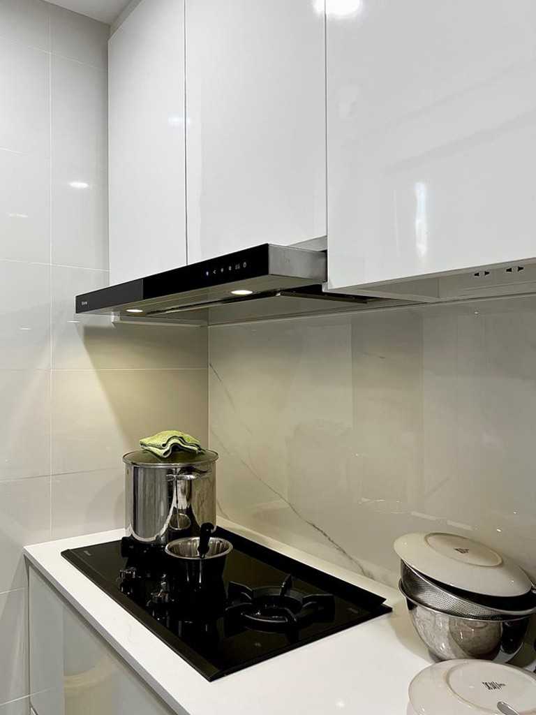 Modern Kitchen with Kitchen Accessories and Paintings