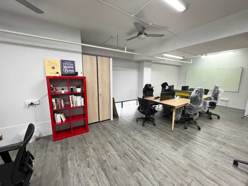 Modern Office with Paintings and Desk Chairs