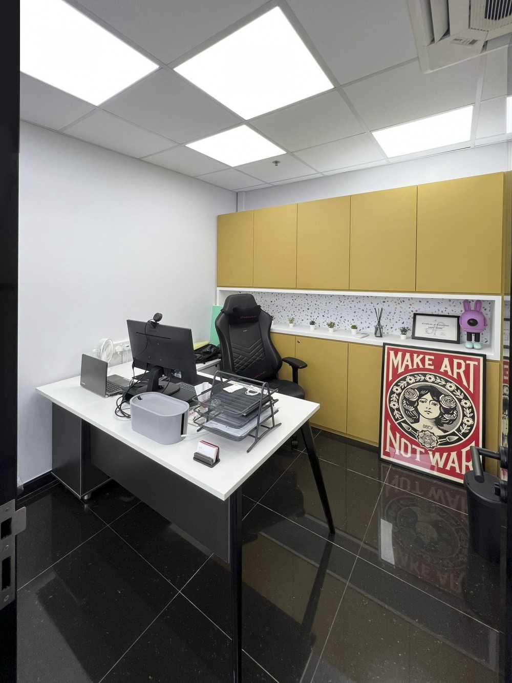 Modern Office with Sideboard and Paintings