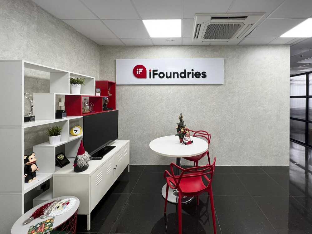 Modern Office with Feature Wall and Desk Chairs