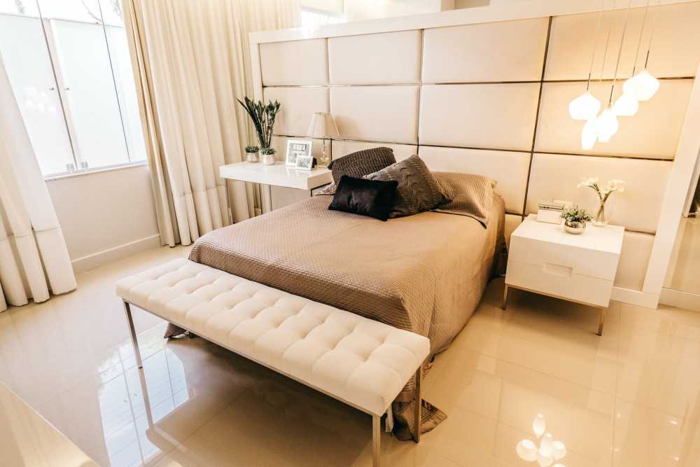 Vintage Bedroom with Homogeneous Tiles and Bedside Table