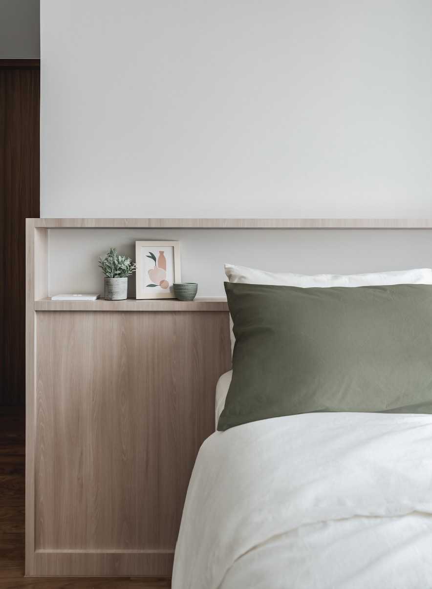 Scandinavian Bedroom with Bookshelf and Queen Bed