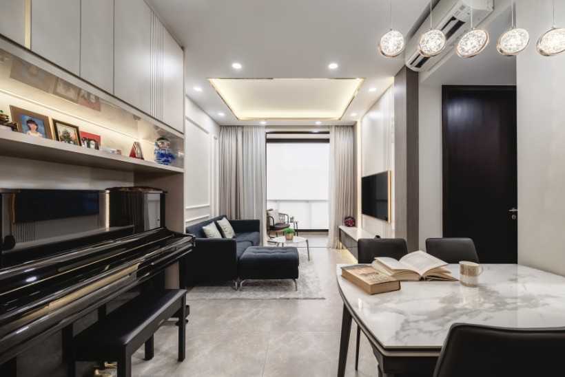 Modern Living Room with Homogeneous Tiles and TV Console