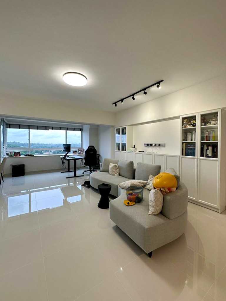 Modern Living Room with Window Seat and Paintings