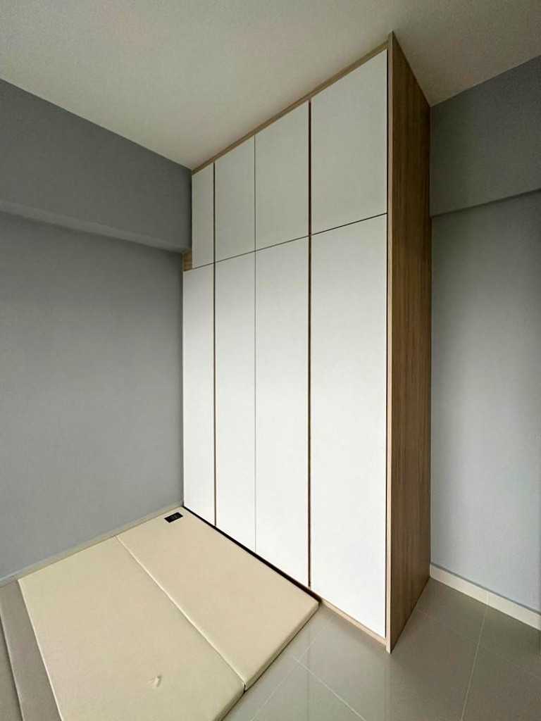 Modern Bedroom with Wardrobe and Paintings