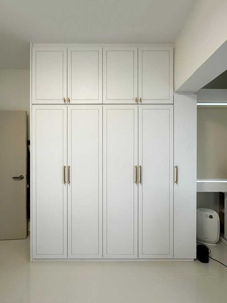 Modern Bedroom with Wardrobe and Paintings