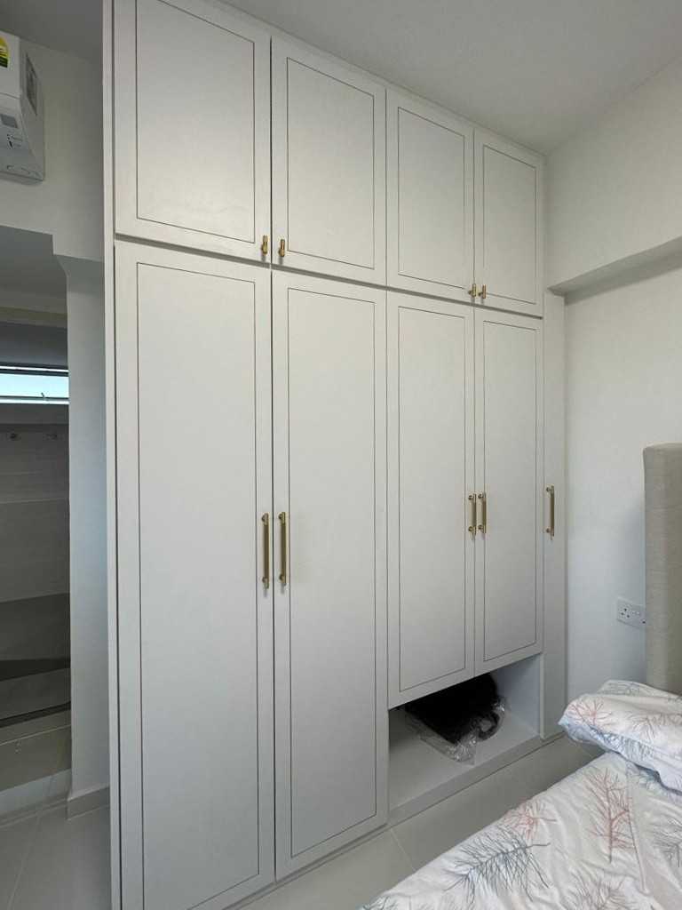Modern Bedroom with Wardrobe and Paintings