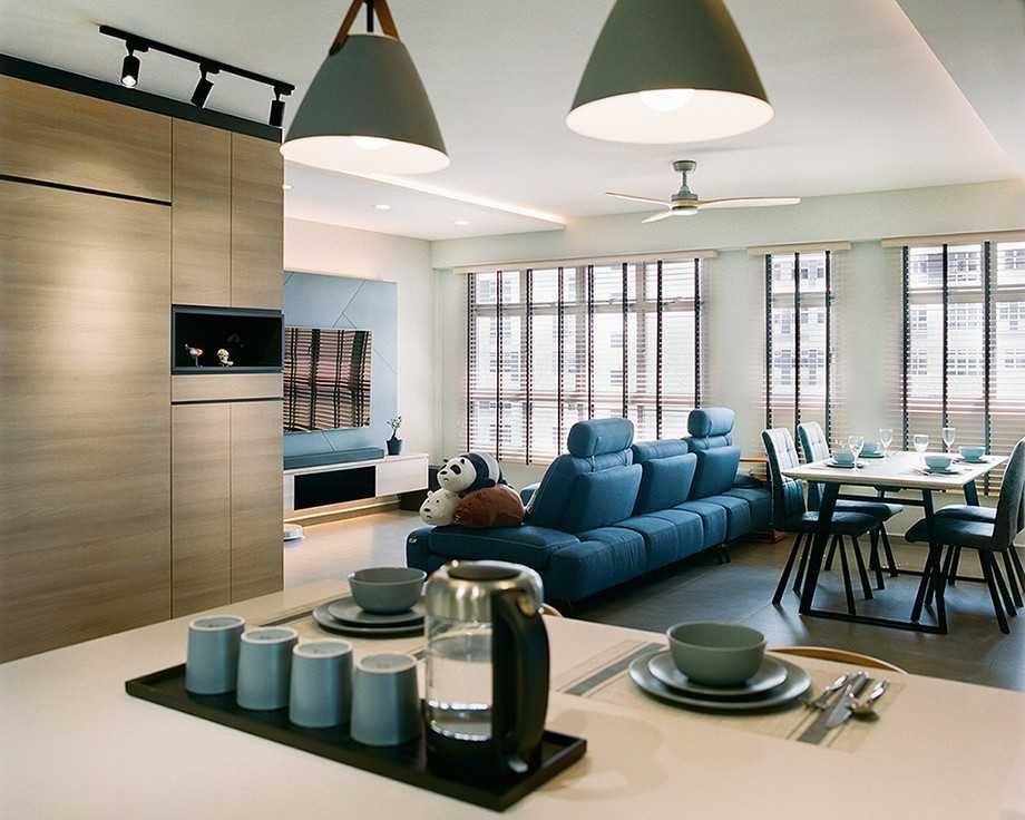 Scandinavian Living Room with Homogeneous Tiles and TV Console