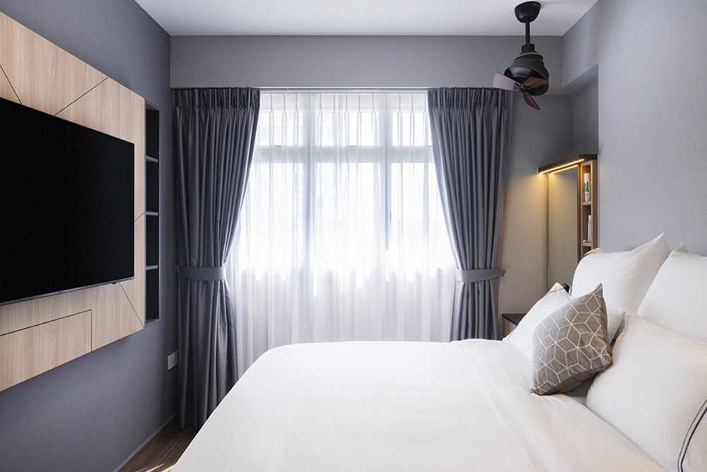 Scandinavian Bedroom with Homogeneous Tiles and Bedside Table