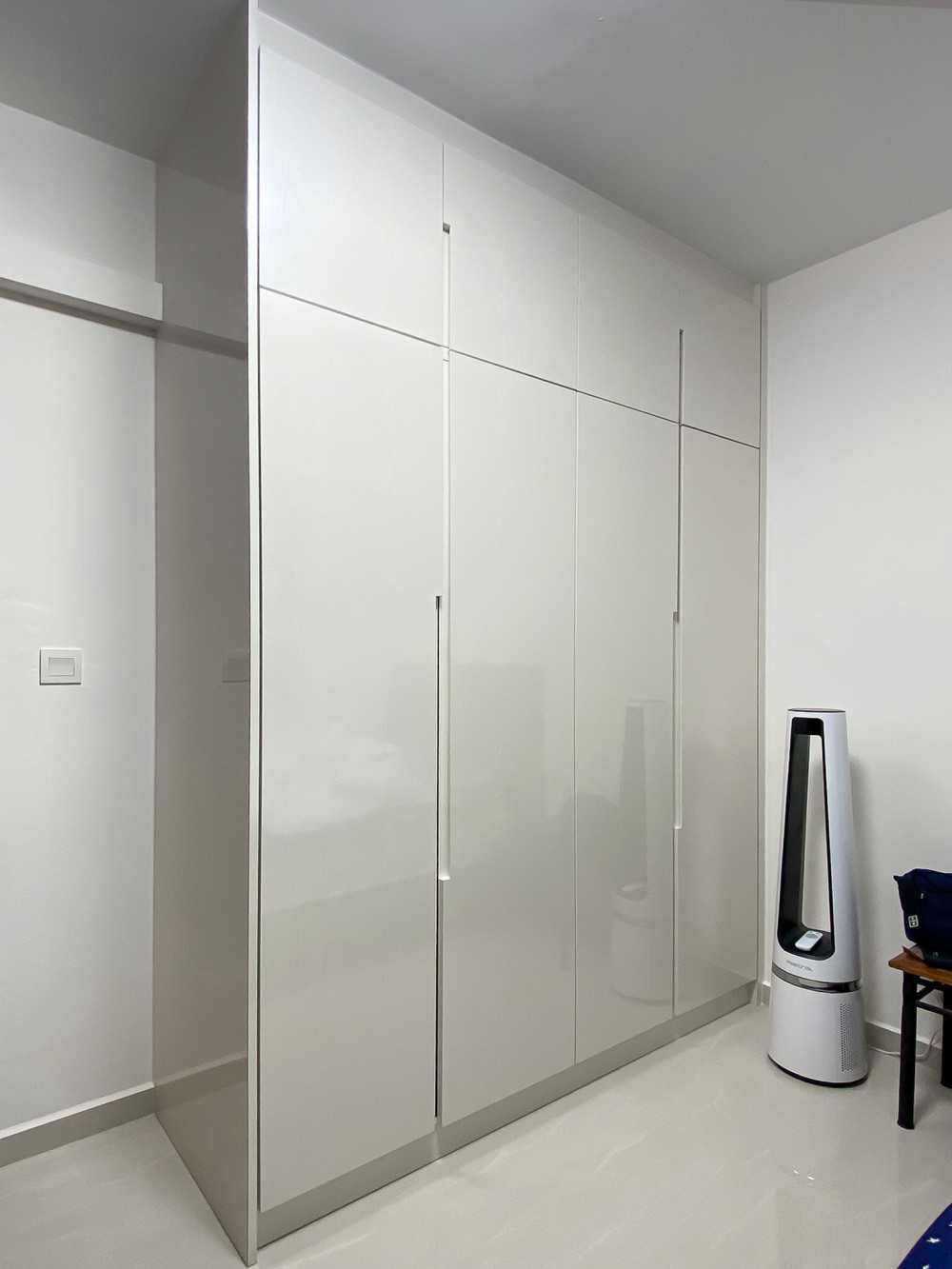 Scandinavian Bedroom with Wardrobe and Paintings