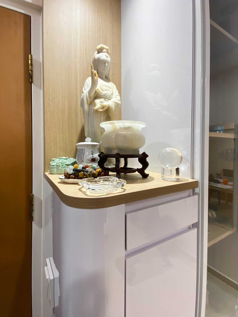 Scandinavian Foyer with Paintings and Storage Cabinets