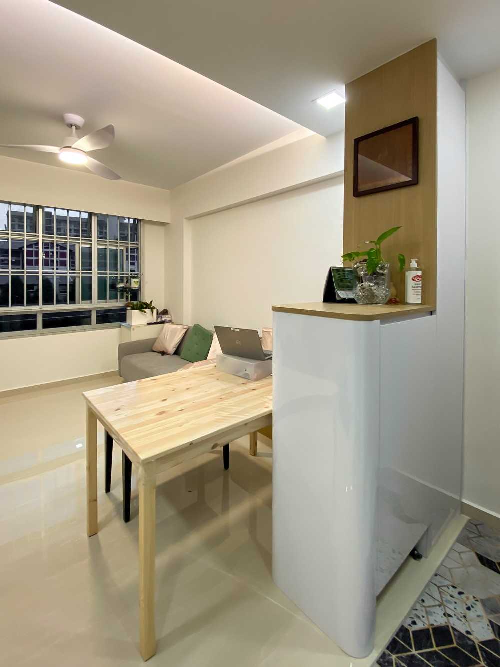 Scandinavian Foyer with Dining Table and Paintings