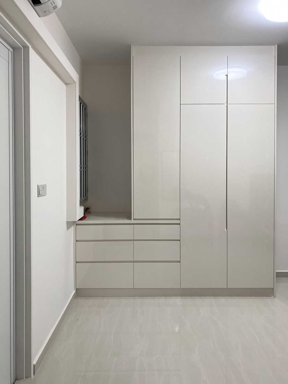 Scandinavian Bedroom with Wardrobe and Paintings