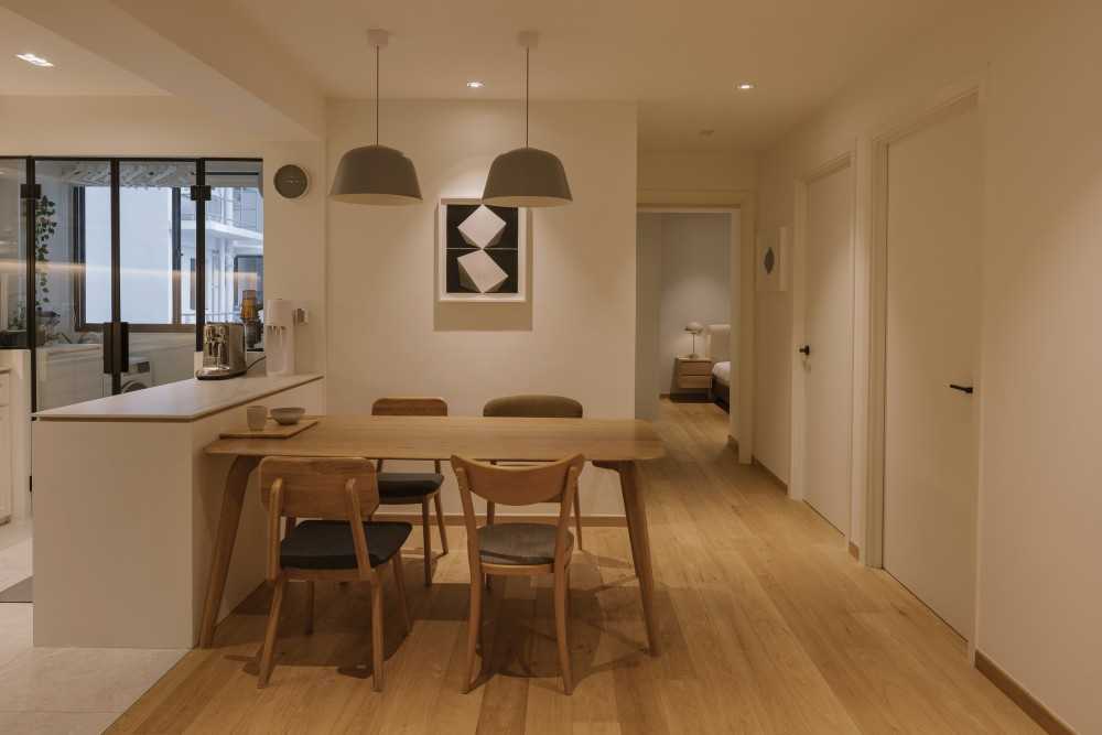 Modern Dining Room with Vinyl Flooring and Artwork