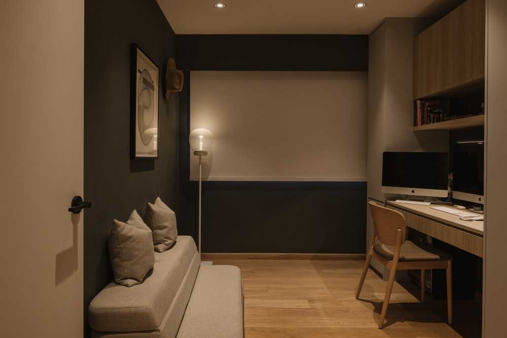 Modern Home Office with Bookshelf and Desk Chairs