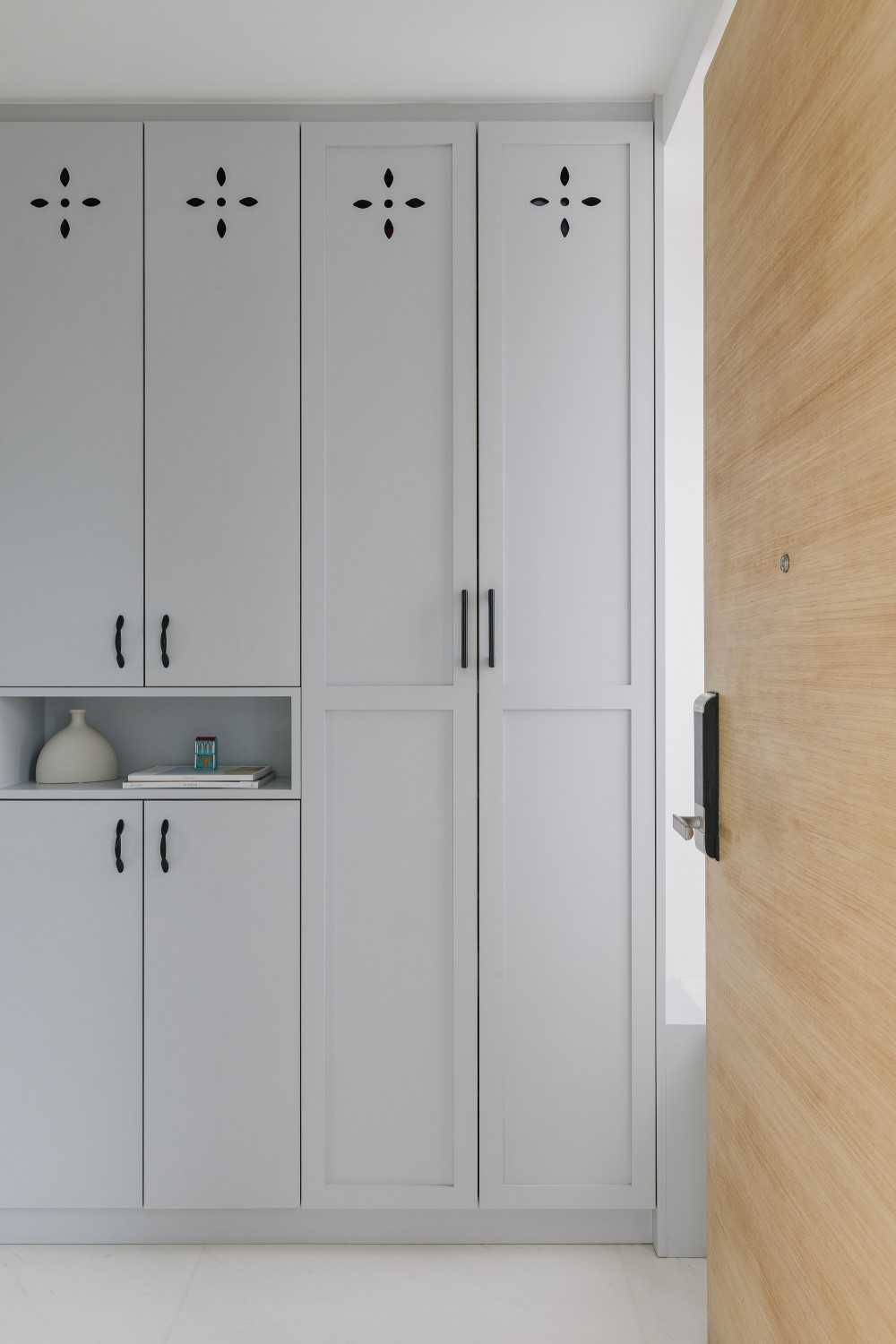 Modern Entryway with Storage Cabinets and Small Storage