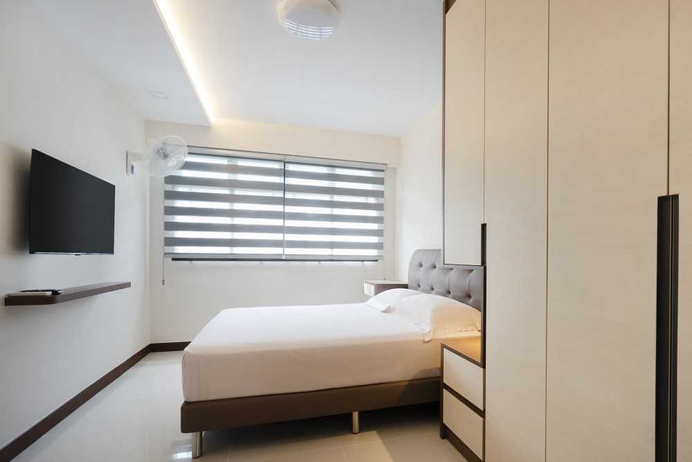 Contemporary Bedroom with Cove Lighting and Wardrobe