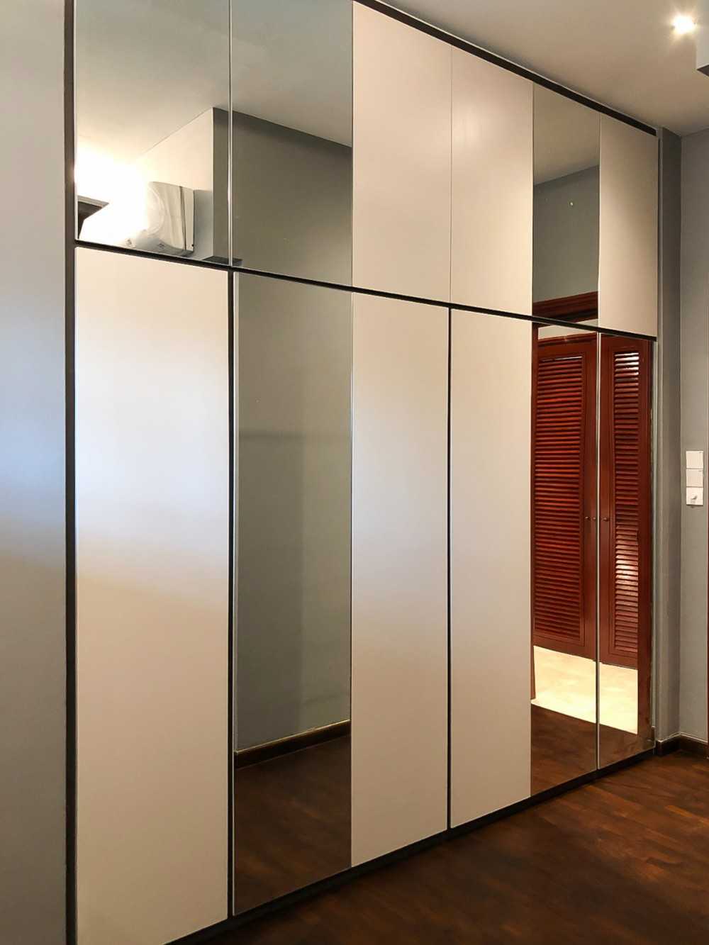 Modern Bedroom with Wardrobe and Paintings
