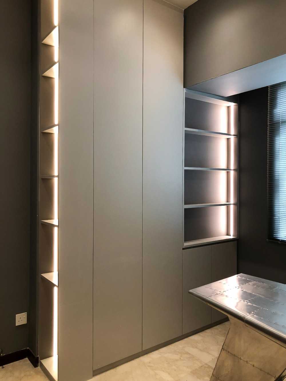 Modern Study with Paintings and Storage Cabinets