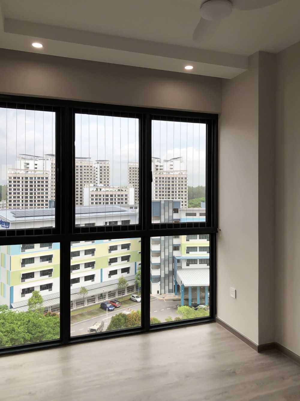 Modern Living Room with Window Grille and Paintings