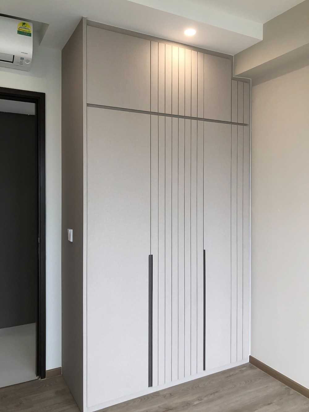 Modern Bedroom with Wardrobe and Paintings