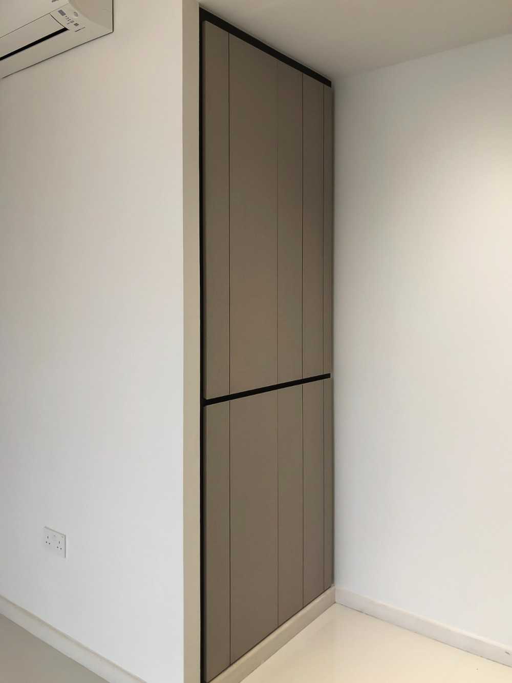 Modern Foyer with Paintings and Storage Cabinets