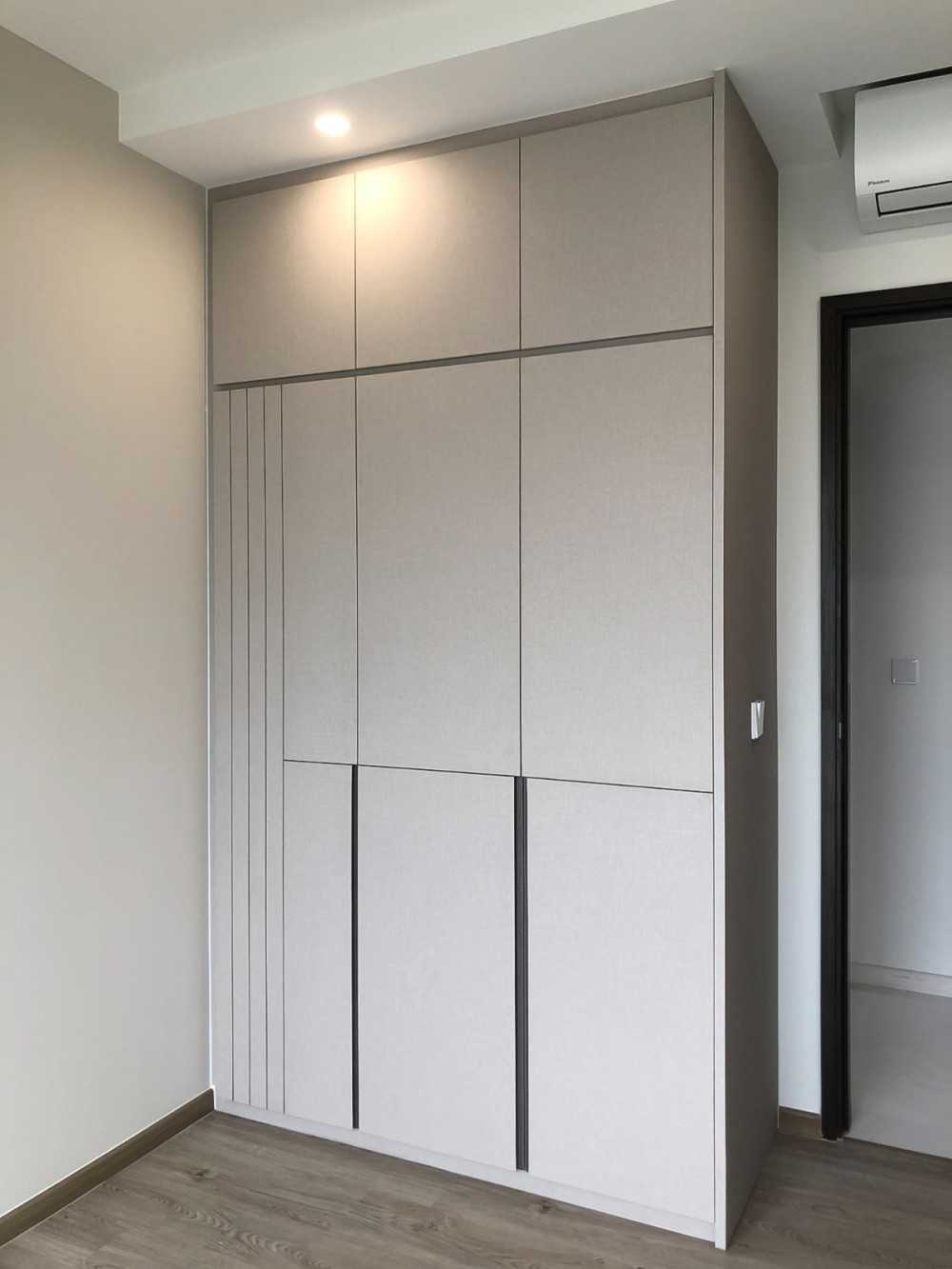 Modern Bedroom with Wardrobe and Paintings