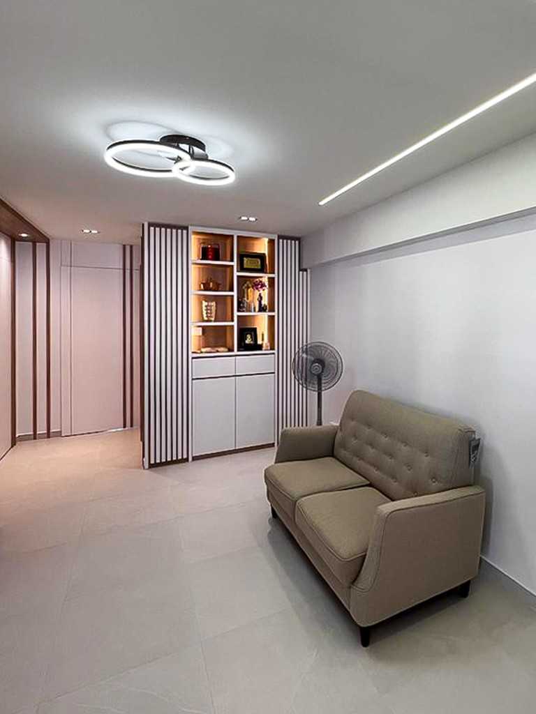 Scandinavian Living Room with Panelling and Paintings